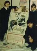 [unique photo of my students with our cavalryman's tombstone!]